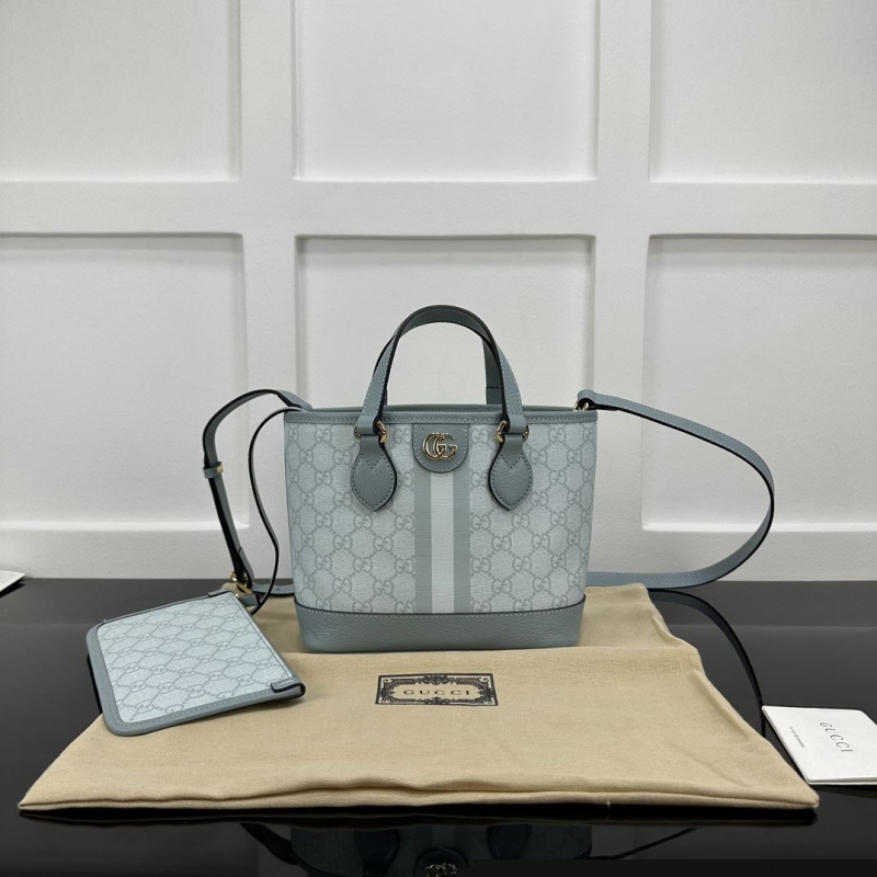 G*u*i shopping bags
